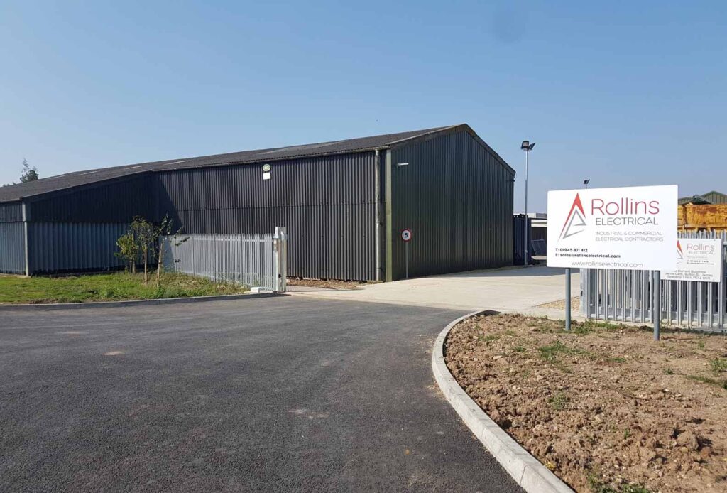 The construction of a new agricultural building with an internal concrete floor and an external concrete yard area.